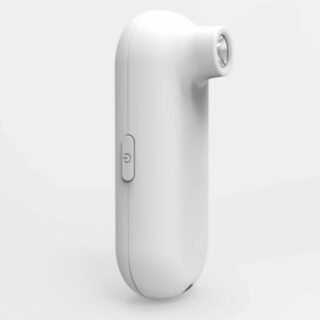 thermomètre infrarouge en plastique blanc sur fond blanc