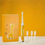 Brosse à dents électrique pour enfant, en forme de bâton avec le dessin d'une girafe, fournit avec 3 têtes de rechange.