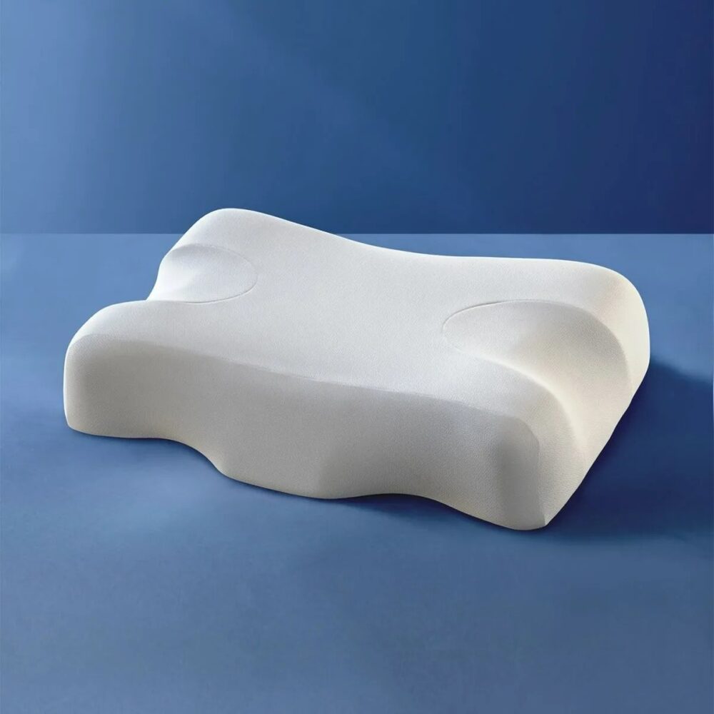 Oreiller anti ronflement, blanc rectangulaire avec des formes spéciales pour se caler.