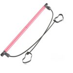 Barre de yoga rose pour sport à la maison sur fond blanc