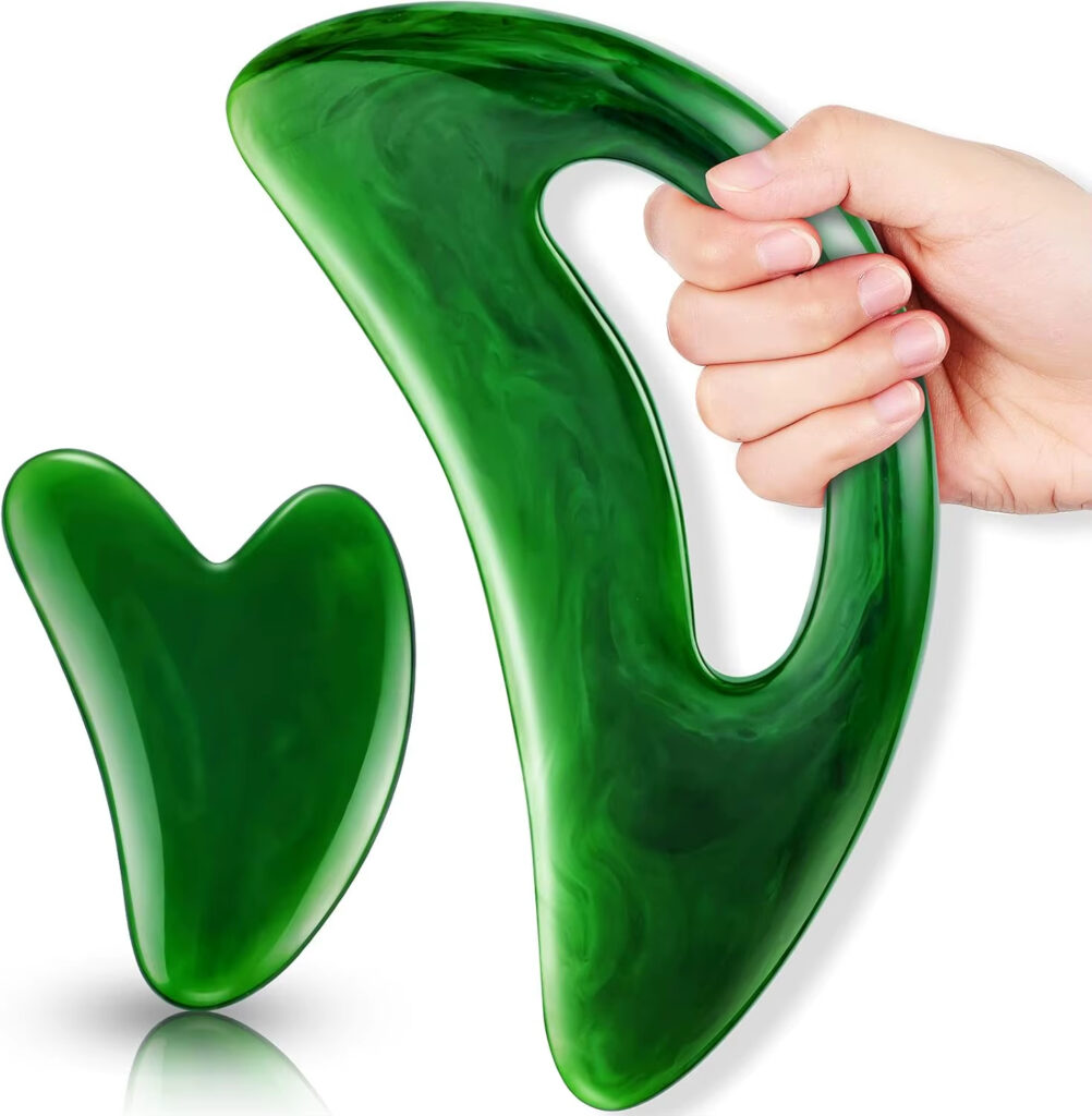 Lot de 2 accessoires de massage Gua Sha sur fond blanc