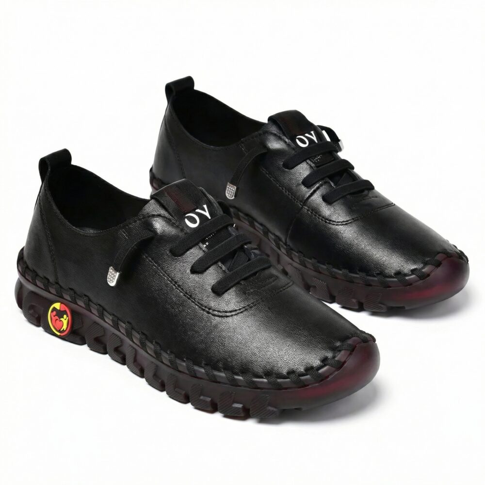 Paire de chaussures orthopédiques noires souples pour femme 1